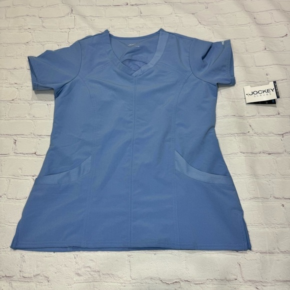 JOCKEY Ciel Blue V neck women’s scrub top in size Small  Omni Stretch - Picture 1 of 14
